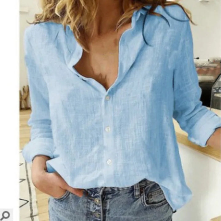 Smart women's button-up blouse, featuring an attractive bird print and long sleeves. Office friendly.