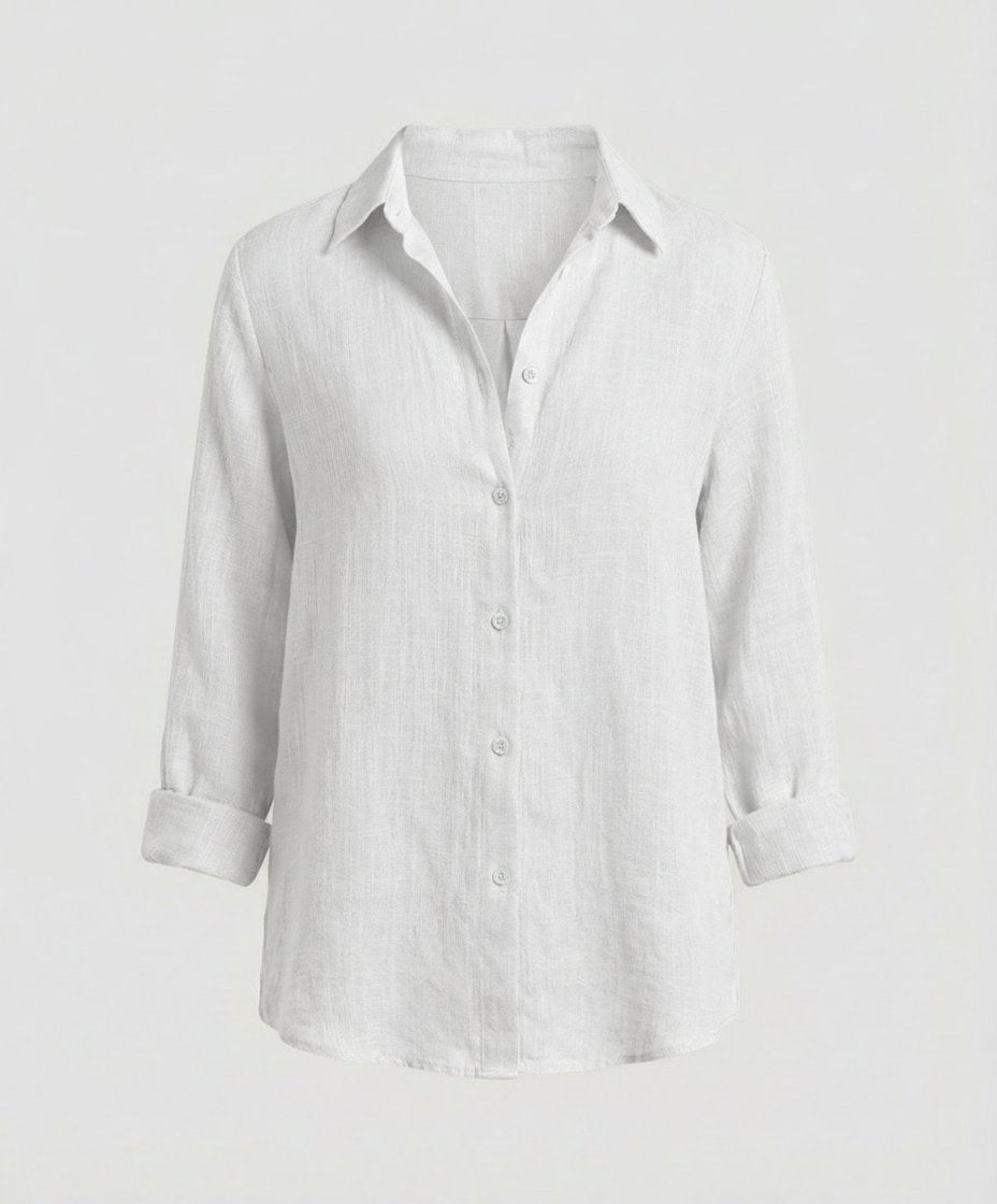 Effortless women's button-up top, long-sleeve relaxed fit, great for versatile layering and everyday style.