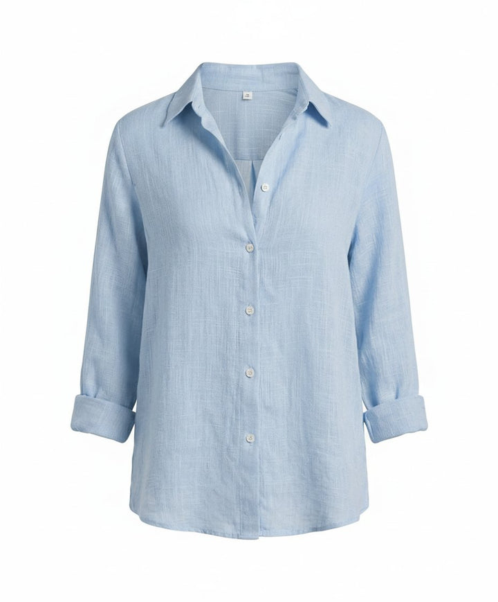 Classic women's button-up shirt, a timeless relaxed-fit design for smart casual and everyday wear.