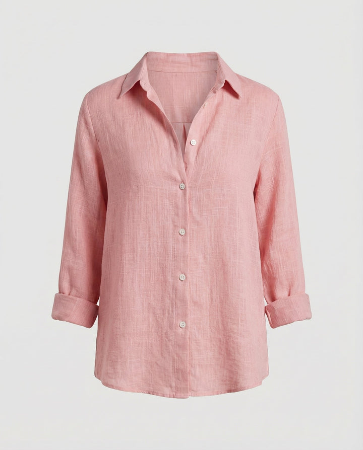 Model wearing a women's relaxed-fit button-up shirt, perfect for versatile spring and summer styling.