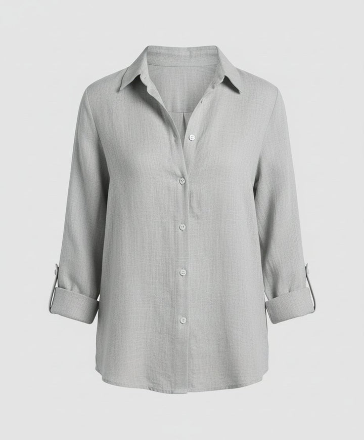 Comfortable women's long-sleeve button-up shirt with a relaxed fit for an easy, timeless casual look.