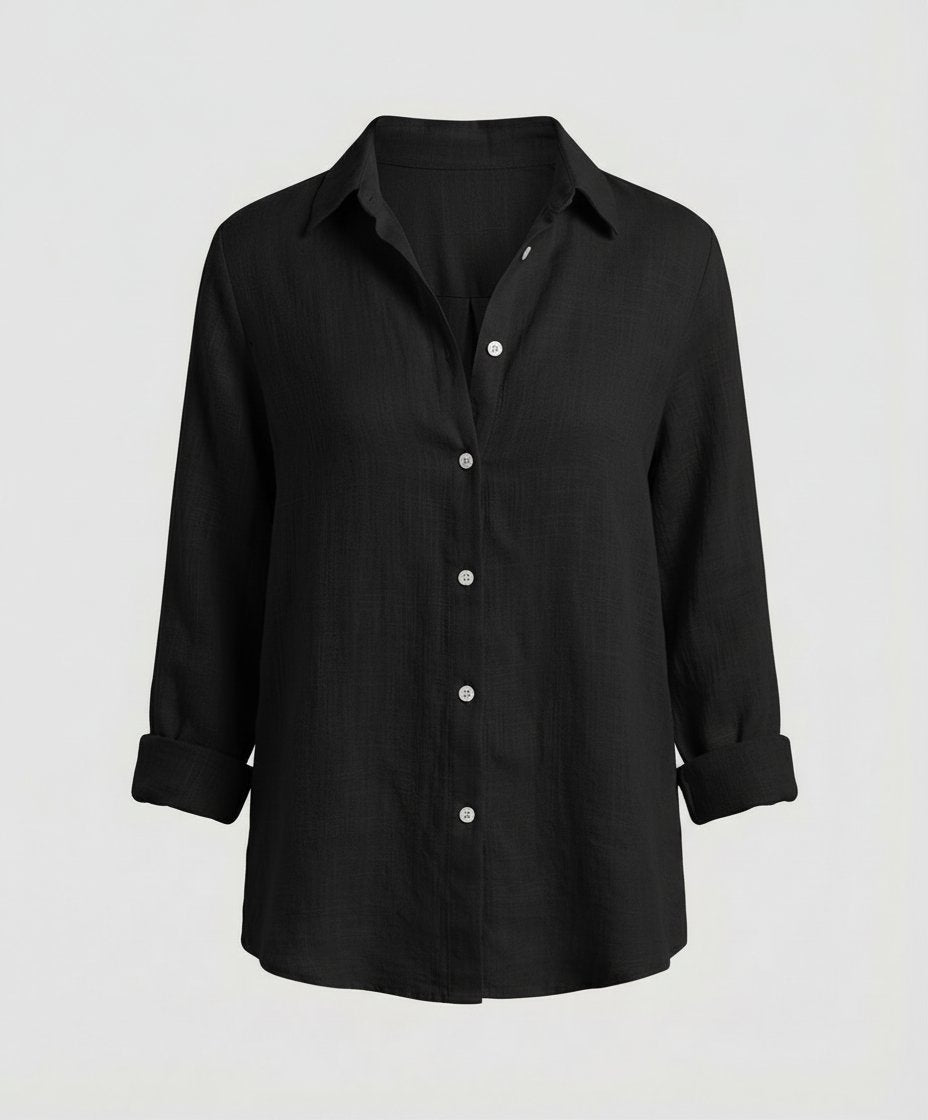 Elegant women's button-up shirt, relaxed long-sleeve fit, a versatile top for office and casual occasions.