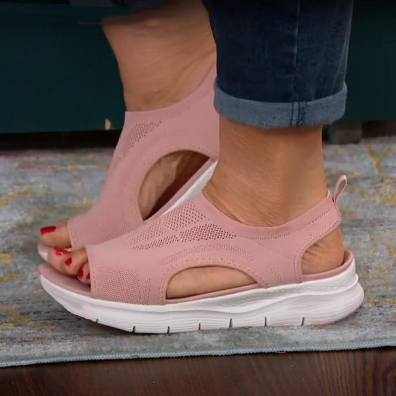 Stylish women's flat sandals for summer. Features include arch support, non-slip design, and adjustable comfort.