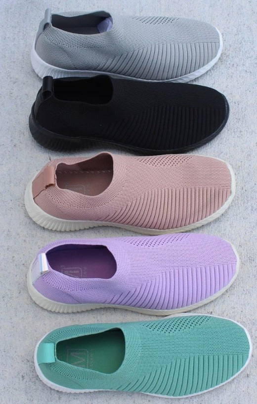 Versatile women's slip-on sneakers. Breathable and comfortable for spring, summer, and fall fashion.