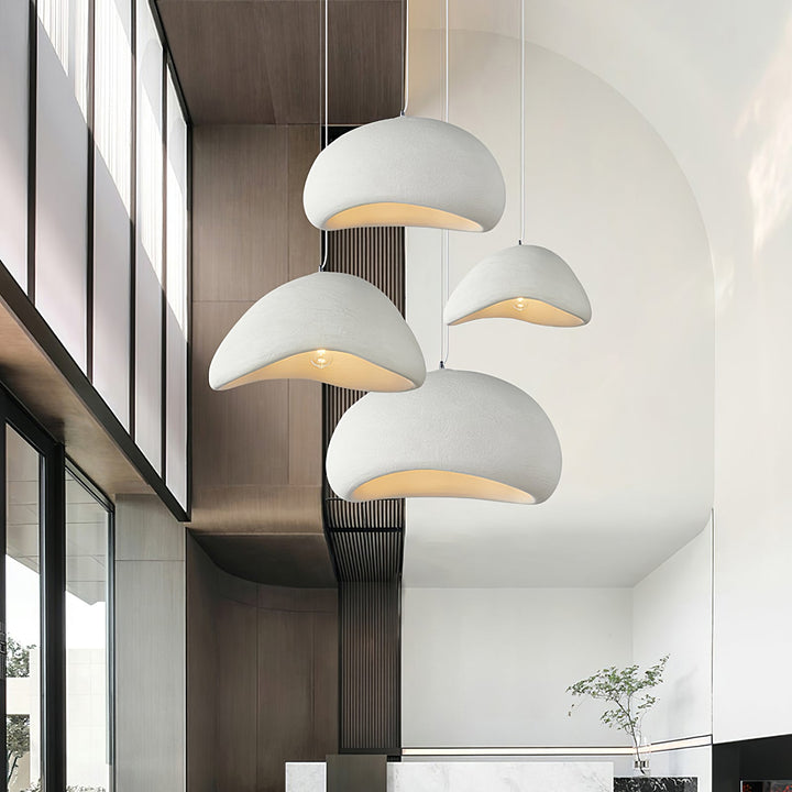 Wabi-Sabi cocoon pendant light. Organic modern ceiling lamp for minimalist decor, diffusing soft ambient light.