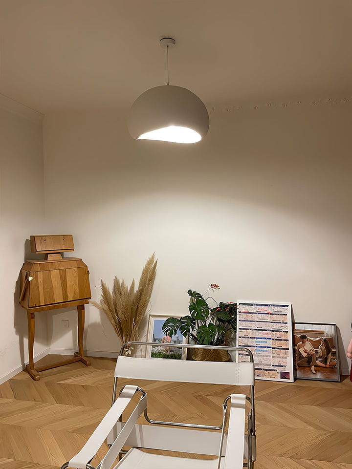 Handcrafted Wabi-Sabi cocoon fabric pendant light. Organic modern ceiling lamp, diffusing a warm, inviting glow.