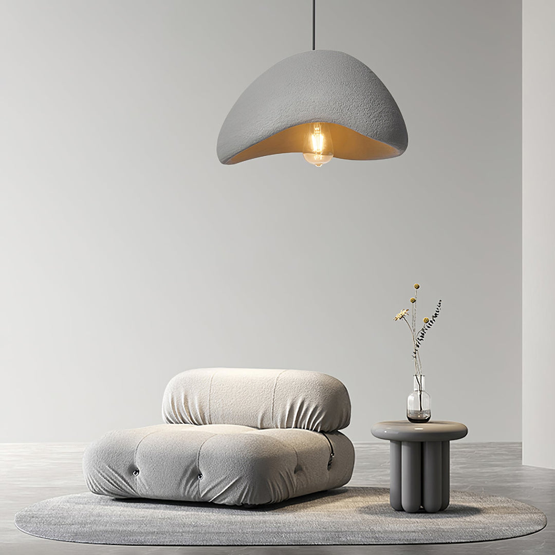 Textured fabric Wabi-Sabi cocoon pendant light, ideal for organic modern interiors and soft ambient illumination.