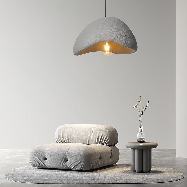Textured fabric Wabi-Sabi cocoon pendant light, ideal for organic modern interiors and soft ambient illumination.
