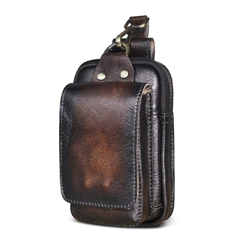 Stylish vintage brown fanny pack worn across chest. Perfect unisex everyday carry sling bag.