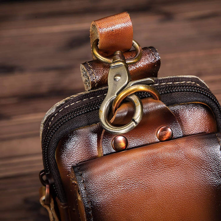 Close-up of vintage brown unisex waist pack. Showcases quality & style for everyday carry.