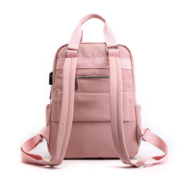 Functional multi-compartment backpack, water-resistant and anti-theft.