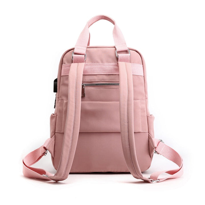 Functional multi-compartment backpack, water-resistant and anti-theft.