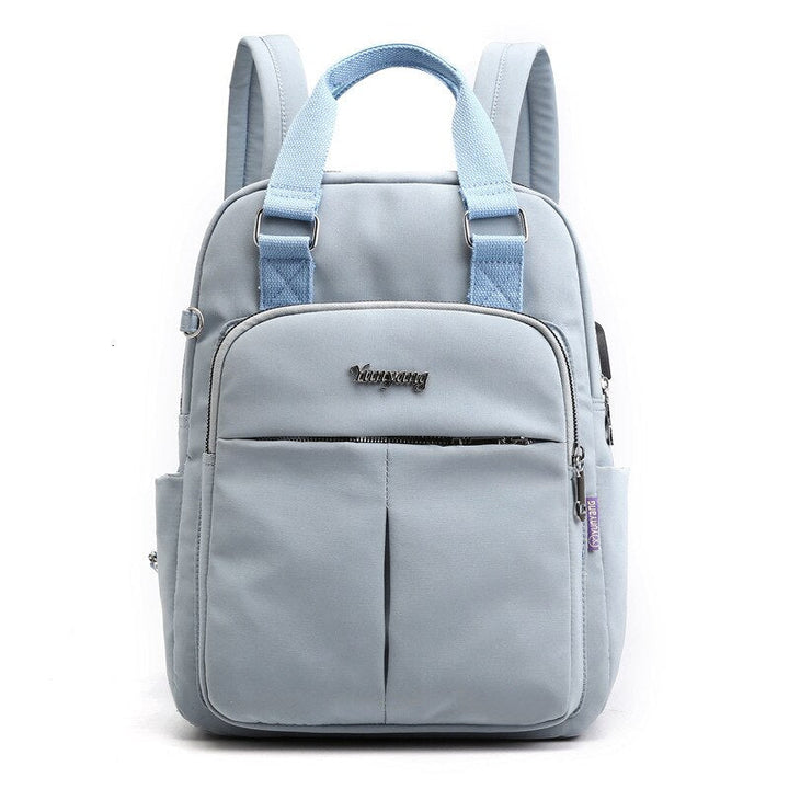 Spacious multi-compartment backpack with hidden zippers for added security.