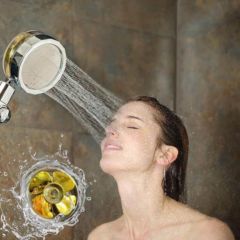 Modern universal high-pressure water-saving shower head installed in a clean bathroom, enhancing daily shower efficiency.