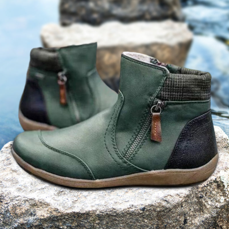 Women's waterproof orthopedic ankle boots with easy-zip closure for comfort & support.