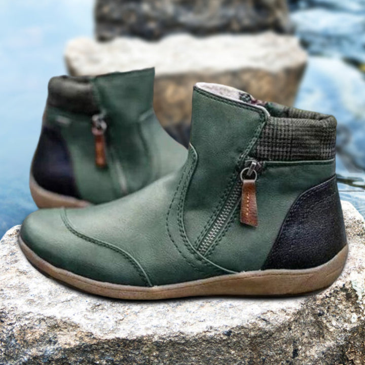 Women's waterproof orthopedic ankle boots with easy-zip closure for comfort & support.