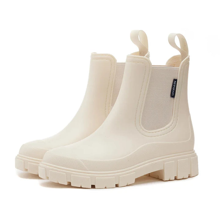 Comfortable women's fashion Chelsea ankle rain boots, perfect for everyday wear in wet conditions.