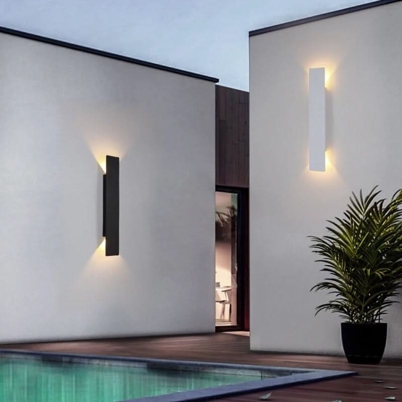Robust, all-season LED wall sconce, weather-resistant for reliable outdoor lighting in any climate.
