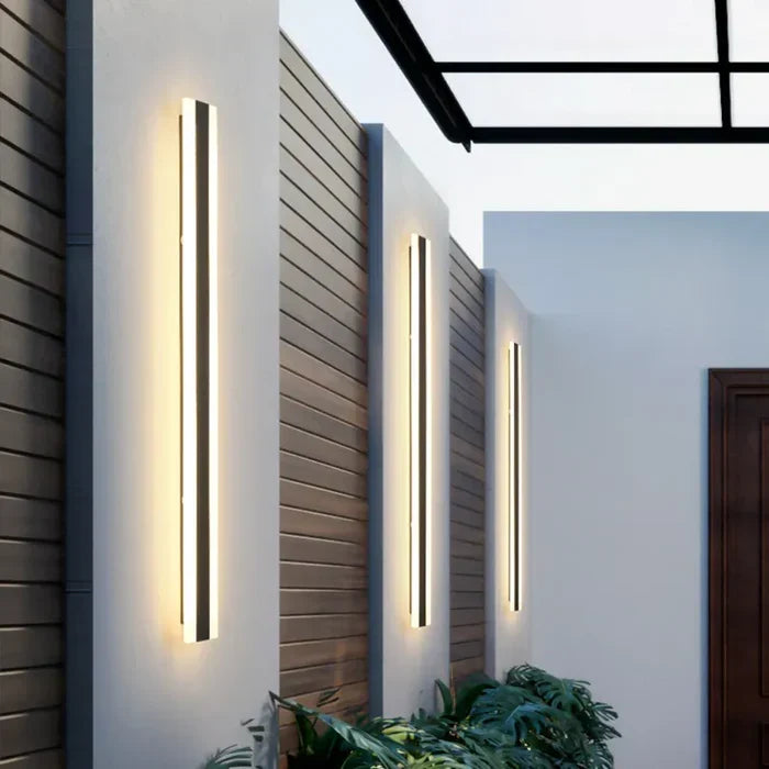 Sleek black outdoor LED wall lamp, ideal for modern garden and exterior home illumination.