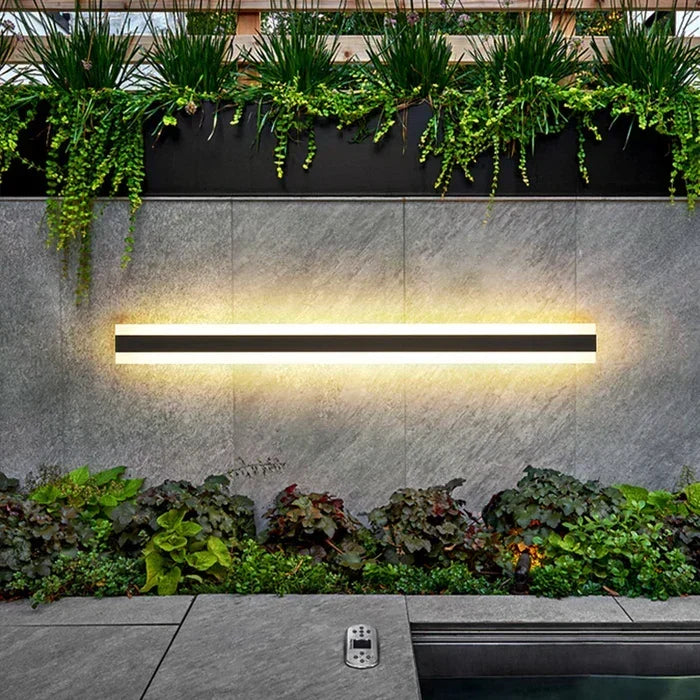 Durable weatherproof LED exterior sconce light, contemporary design for driveways and pathways.