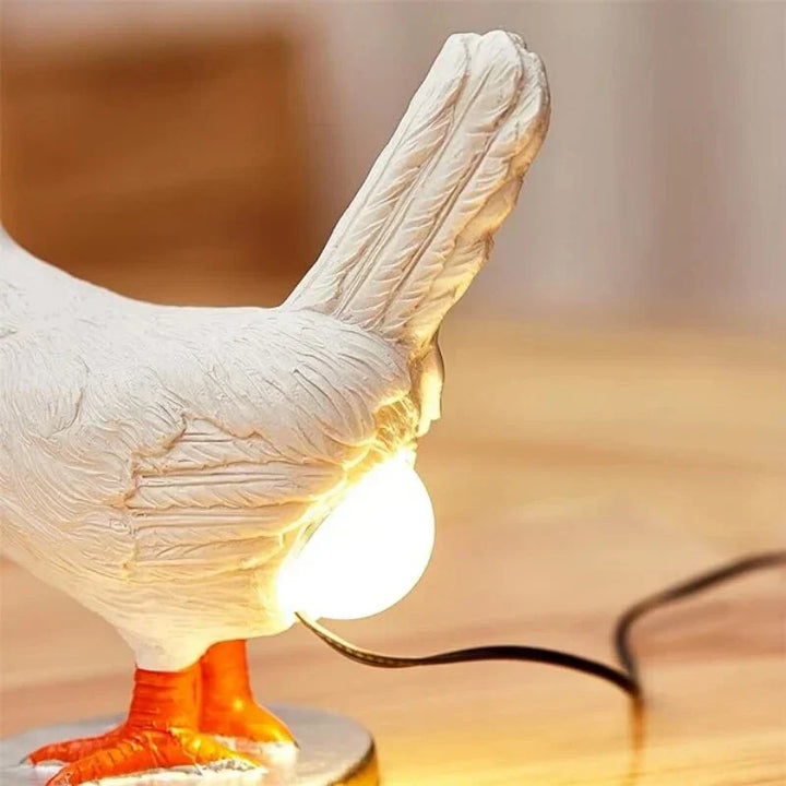 Whimsical chicken table lamp, a fun novelty lighting piece for home decor.