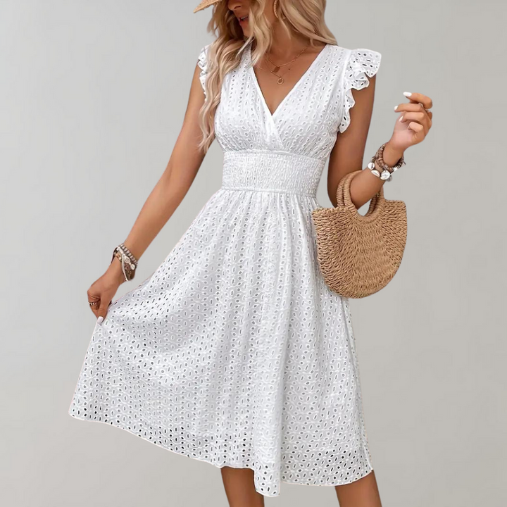 Women's white summer dress with elegant ruffled sleeves. Perfect for casual wear, vacation, or beach.