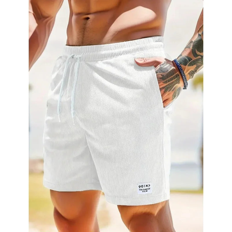 Relaxed fit men's casual shorts with drawstring, perfect for summer activities & comfortable warm weather wear.
