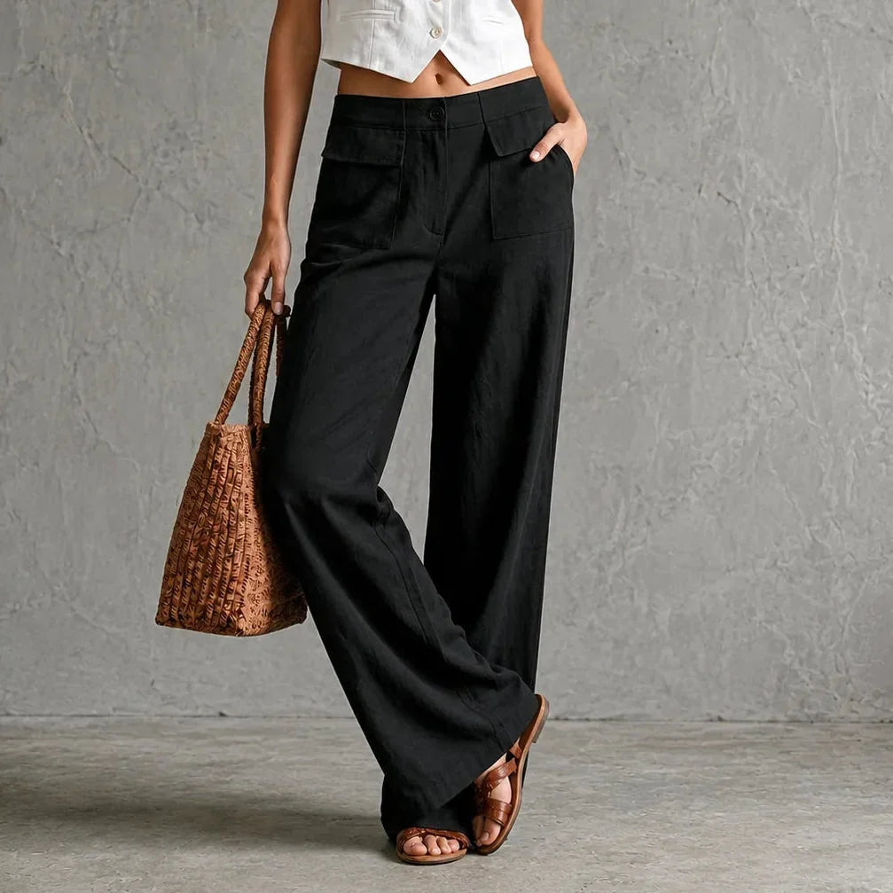 Stylish women's high-waist wide-leg trousers with pockets, offering comfortable everyday fashion.