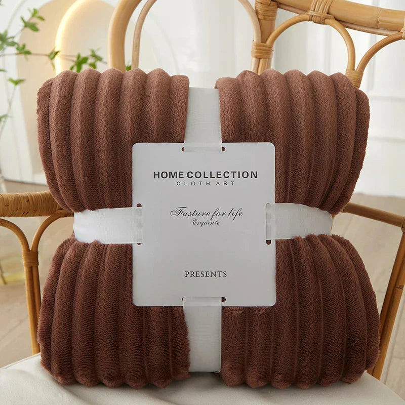 Luxurious wide-stripe flannel fleece throw, perfect for a cozy home ambiance.