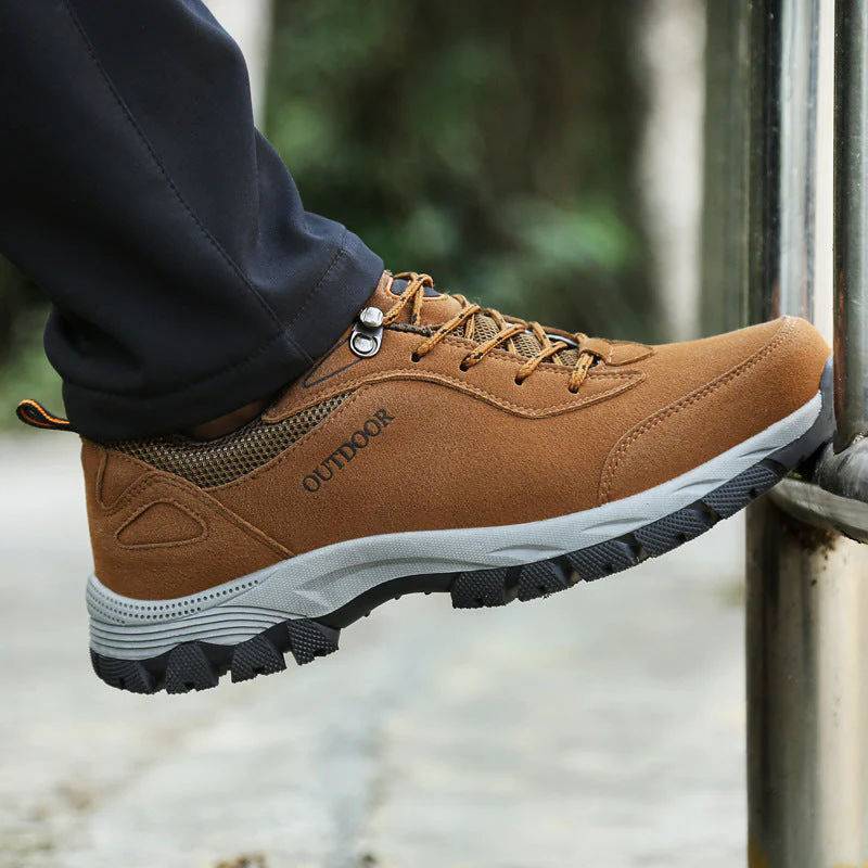 Supportive men's lace-up orthopedic hiking shoes, durable low-top design for an active outdoor lifestyle.