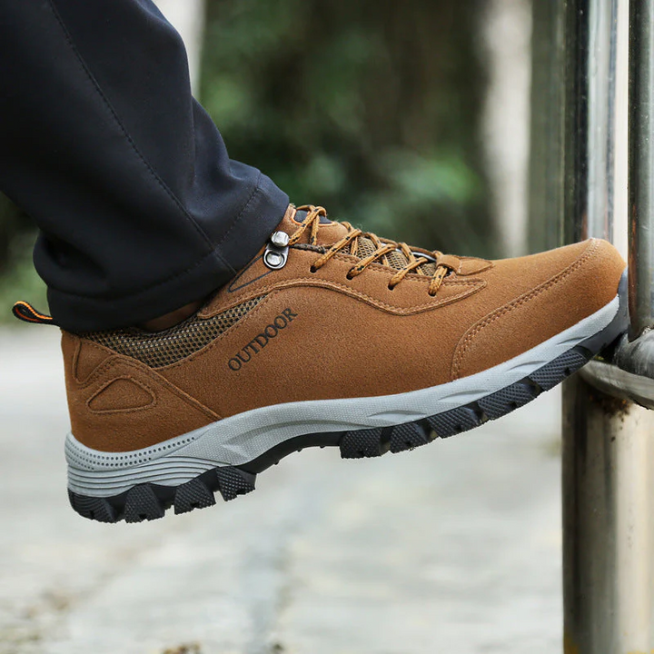 Supportive men's lace-up orthopedic hiking shoes, durable low-top design for an active outdoor lifestyle.