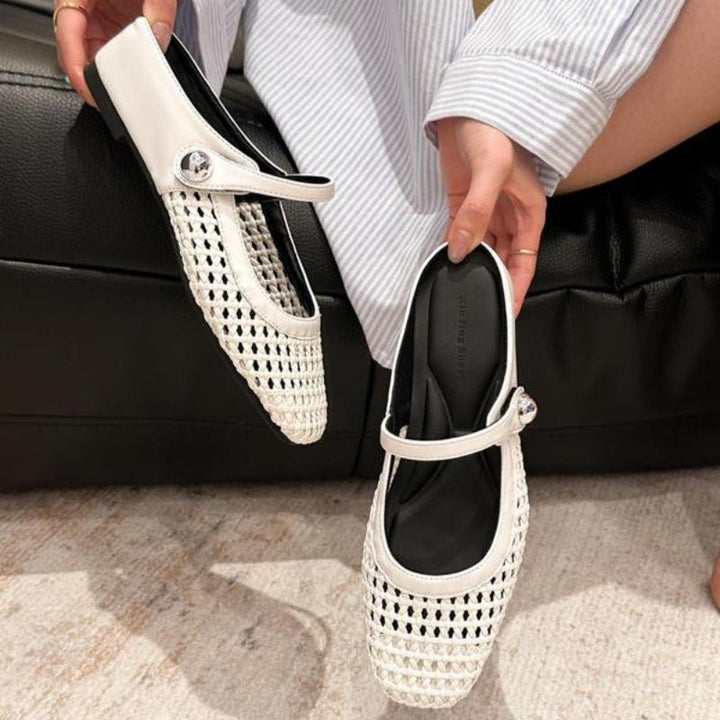 Black woven Mary Jane flat mules, elegant slip-on women's shoes for everyday comfort & chic smart casual style.