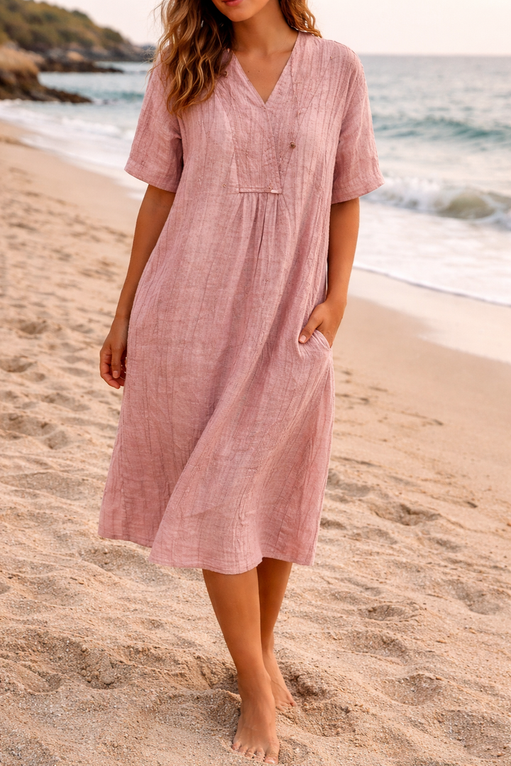 Women's polished relaxed V-neck midi dress, perfect for casual summer wear or beach days.