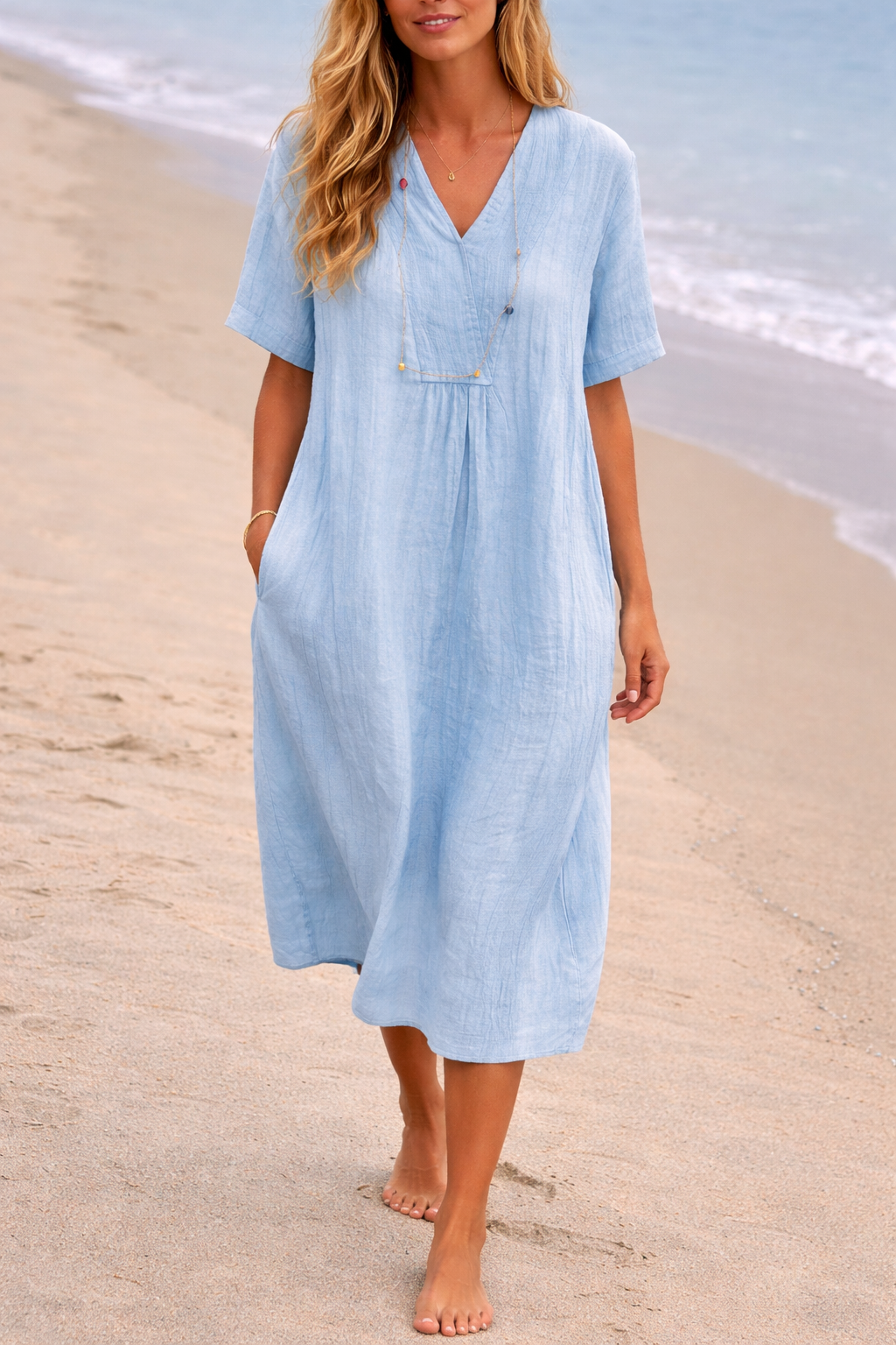 Comfortable blue relaxed fit V-neck midi dress for women, suitable as a casual or beach summer dress.