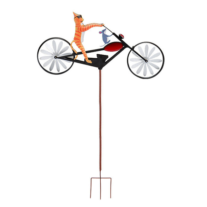 Whimsical bird garden windmill spinner. Stainless steel kinetic outdoor decor, a charming lawn ornament & yard art.