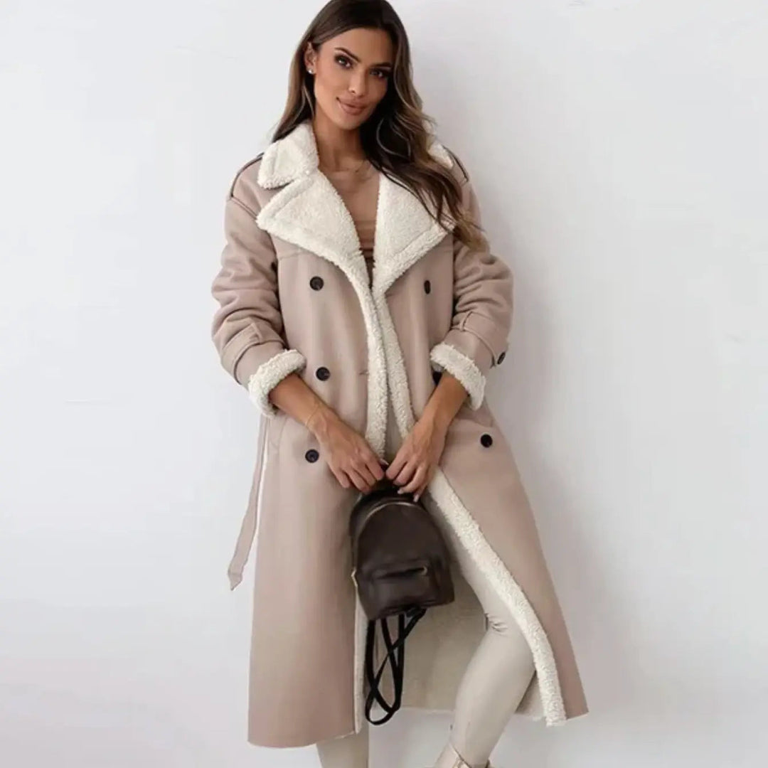 Stylish women's warm long winter coat, featuring a luxurious plush teddy collar. Essential elegant outerwear for cold weather.