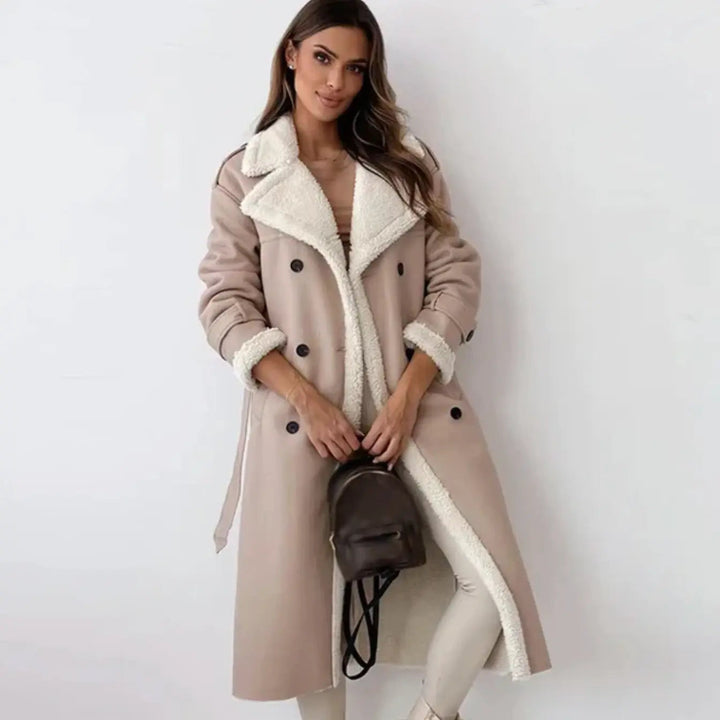 Stylish women's warm long winter coat, featuring a luxurious plush teddy collar. Essential elegant outerwear for cold weather.