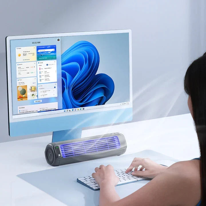 Bladeless portable personal air cooler. Wireless, rechargeable fan for quiet, compact indoor cooling relief.