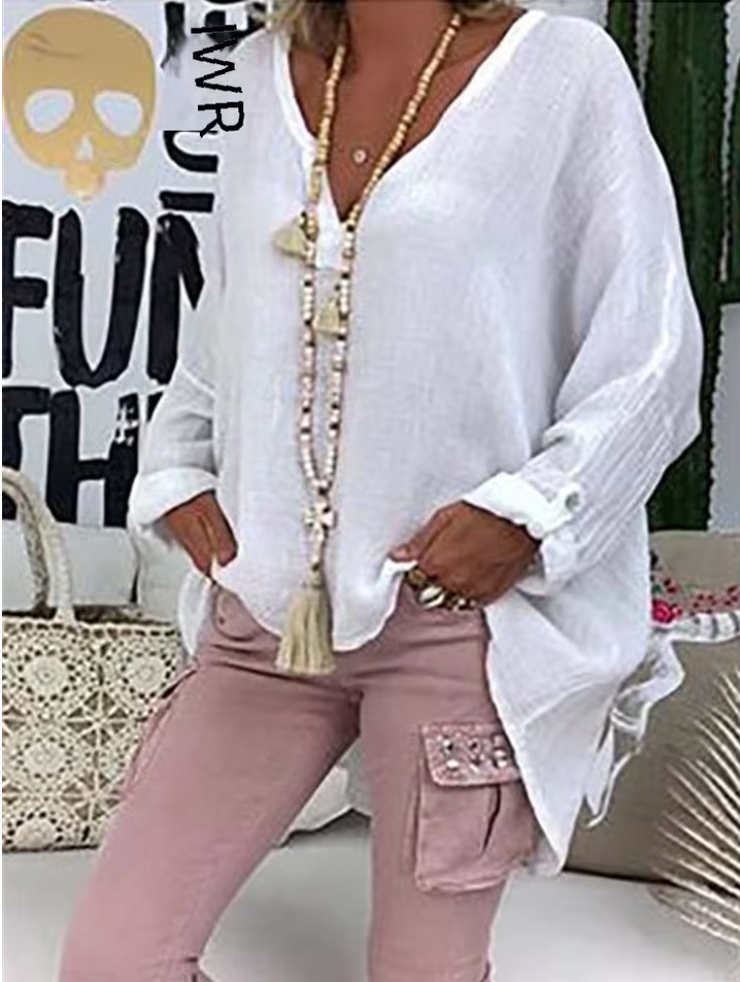 Breathable, lightweight oversized women's blouse with a relaxed fit. Effortless spring/summer fashion.