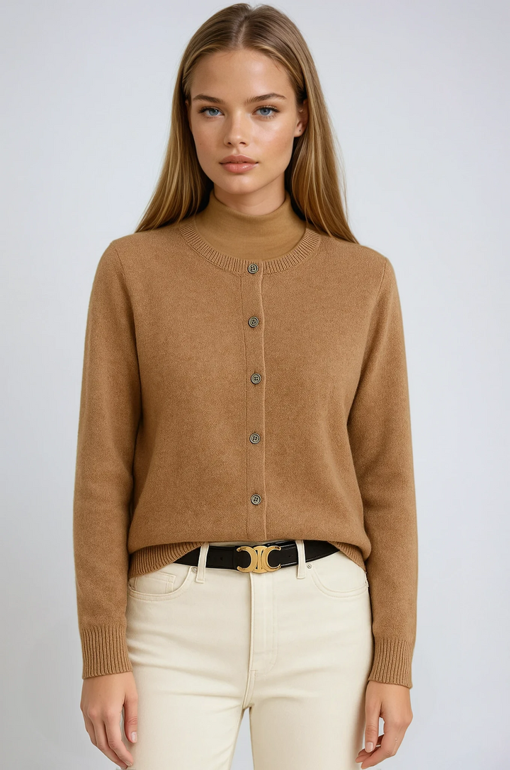 Woman wearing a classic navy blue button cardigan with a round neck, perfect for layering.