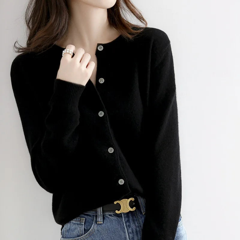 Model styled in a versatile grey women's cardigan, showcasing cozy knitwear for everyday wear.
