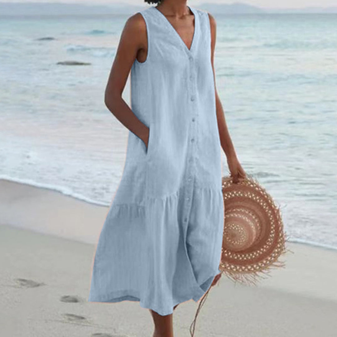 Elegant A-line midi dress for women, V-neck, sleeveless, button-down, with pockets. Perfect for summer fashion.
