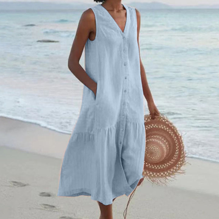 Elegant A-line midi dress for women, V-neck, sleeveless, button-down, with pockets. Perfect for summer fashion.