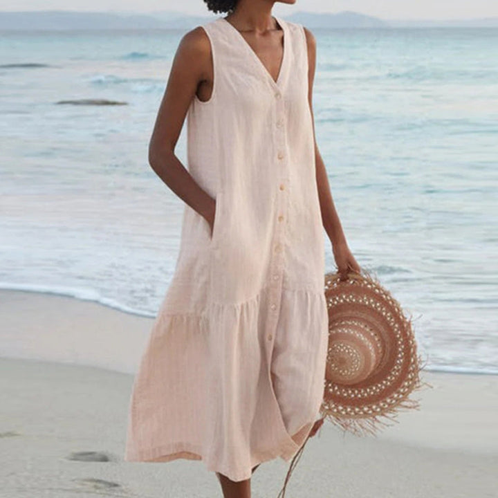 Versatile women's A-line midi dress, sleeveless V-neck, button-front, and pockets. Chic for everyday and summer events.