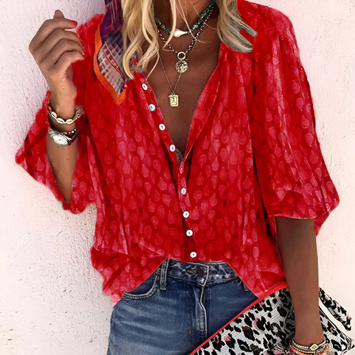 Chic women's button-up blouse, relaxed loose fit, 3/4 sleeves, comfortable and versatile for daily wear.