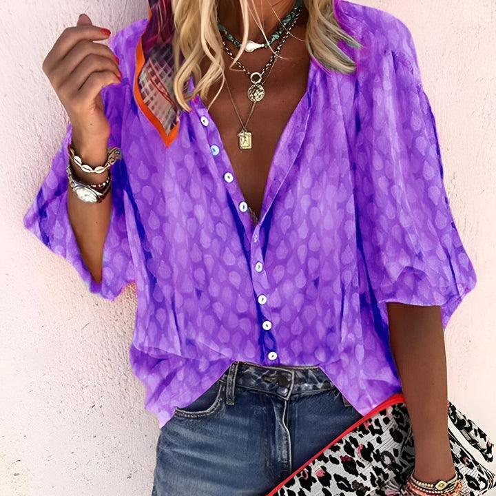 Elegant women's button-up blouse, relaxed fit, 3/4 drop-shoulder sleeves, ideal for casual-chic outfits.