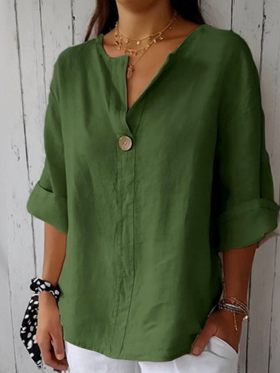 Effortlessly chic women's button down V-neck blouse, a loose fit 3/4 sleeve top perfect for casual elegance.