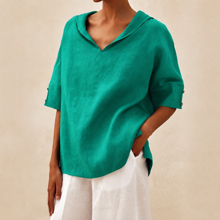 Chic women's V-neck blouse with collar & short sleeves. Perfect for office or casual wear. Elegant summer top.