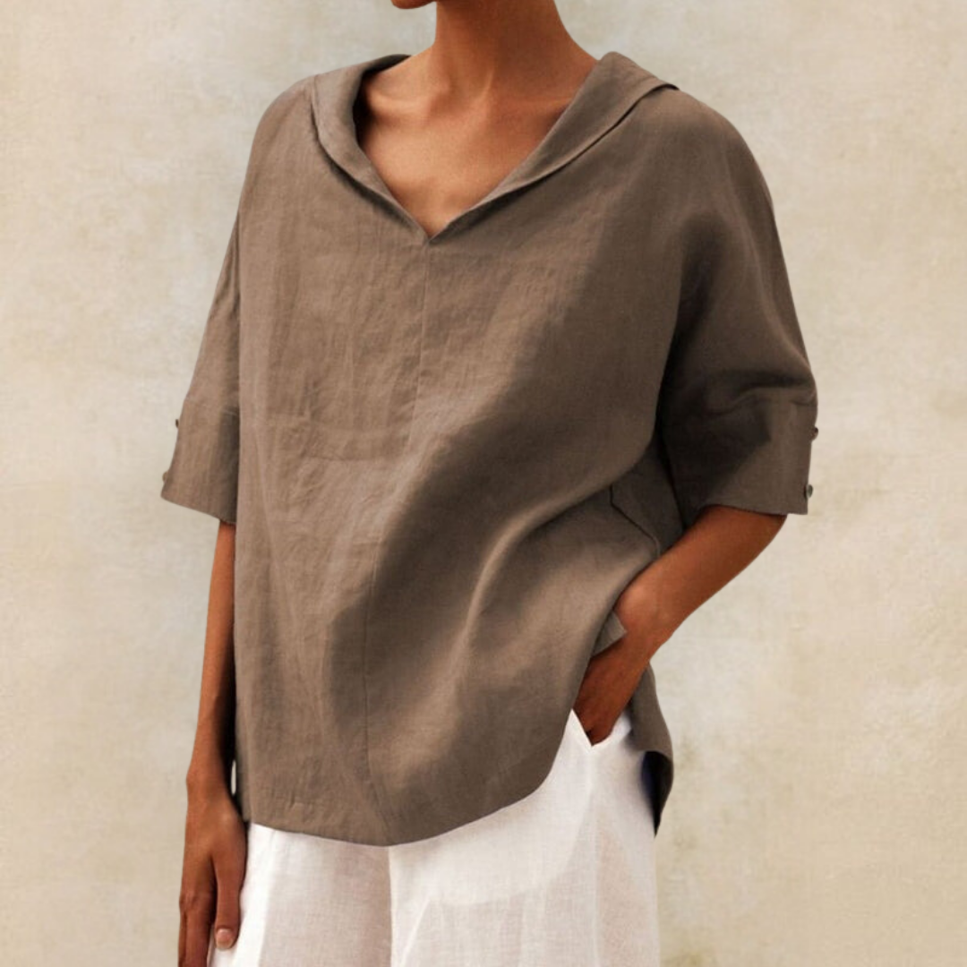 Professional women's V-neck blouse with a chic collar & short sleeves. Perfect for office wear & smart casual.