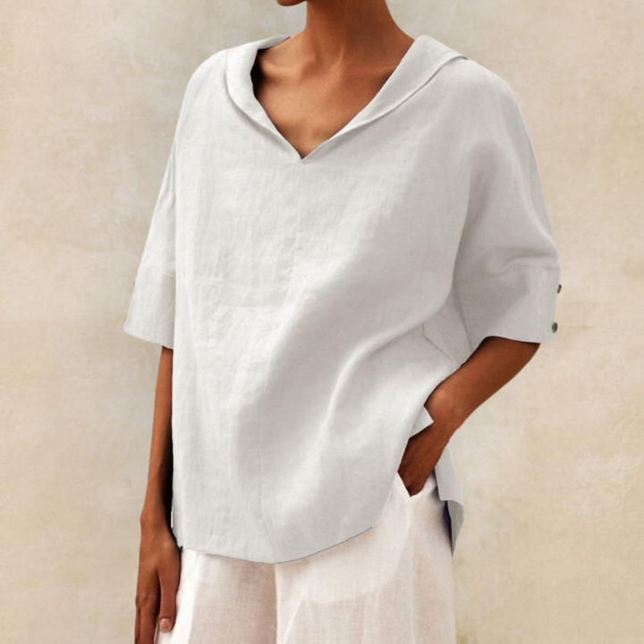 Fashionable women's V-neck short-sleeve top. This chic collared blouse is a versatile addition to any wardrobe.